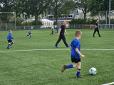 Laatste training S.K.N.W.K. JO10-1 (partijtje tegen de ouders) van woensdag 22 mei 2024 (74/133)